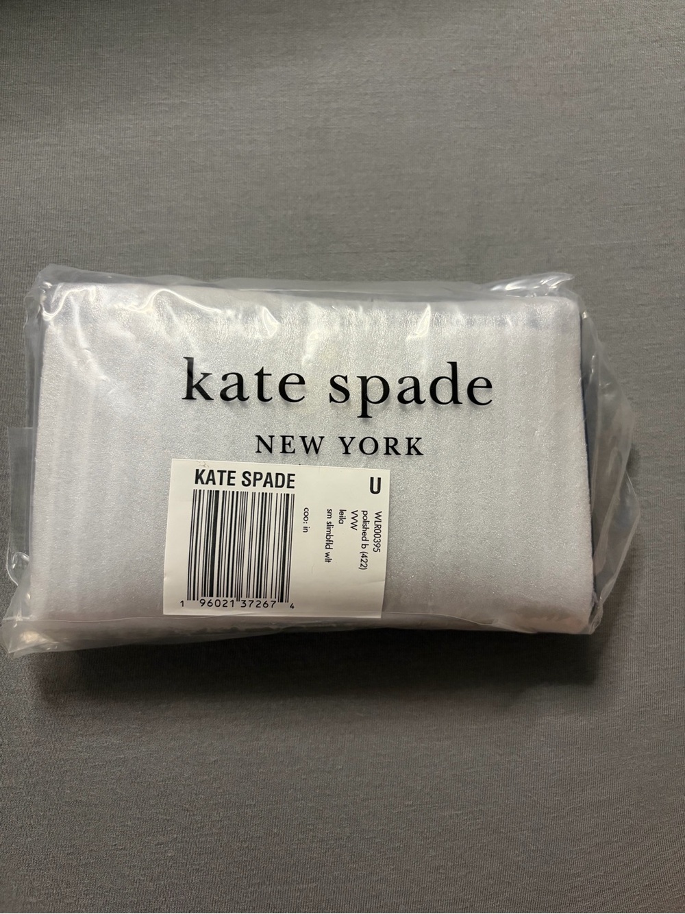 Kate Spade Small Slimfold Wallet in Polished Blue Pebbled Leather with Gold Logo